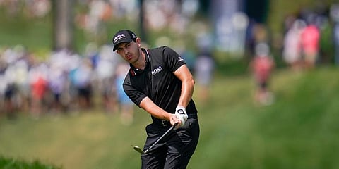 Patrick Cantlay chips onto the fourth green during the third round of the BMW Championship golf tournament, Saturday, Aug. 28, 2021. (Photo | AP)