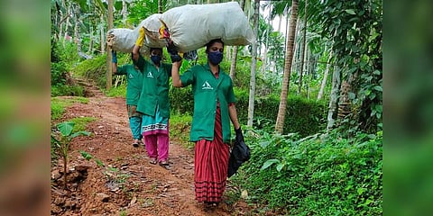 Haritha Sena members carry waste collected from houses at Nadapuram | Express