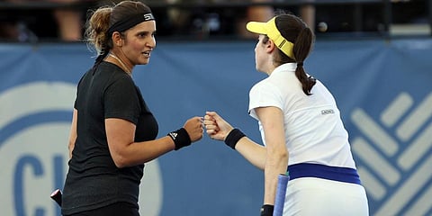 Sania Mirza (L) and Christina McHale celebrate a point during the Tennis in the Land doubles championship against Shuko Aoyama and Ena Shibahara in Cleveland. (Photo | AP)