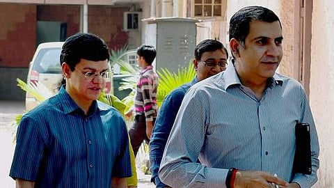 Unitech Ltd's former promoter Sanjay Chandra (R).