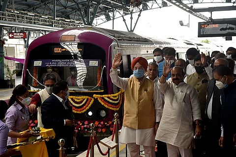 Union Minister Hardeep Singh Puri and Karnataka CM Basavaraj Bommai flagging off the first train on the Mysuru Road-Kengeri Lne from Nayandahalli Metro station. (Photo| Nagaraj Gadekal, EPS)