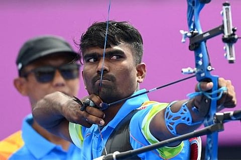 India's Pravin Jadhav competes in the men's team quarter-finals during the Tokyo 2020 Olympic Games at Yumenoshima Park Archery Field in Tokyo on July 26, 2021. (Photo | AFP)