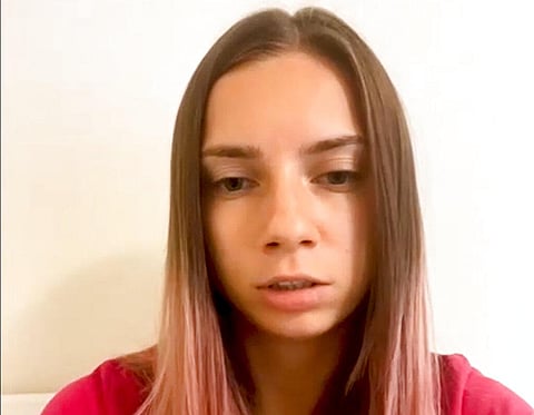 In this photo taken from video, Belarus Olympic sprinter Krystsina Tsimanouskaya speaks during a video interview. (Photo | AP)