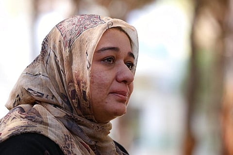 Ghazaal Habibyar, one of the 457 Afghan evacuees housed in Albania, pauses during an interview with the Associated Press. She is housed in a tourist resort in Albania. (Photo | AP)