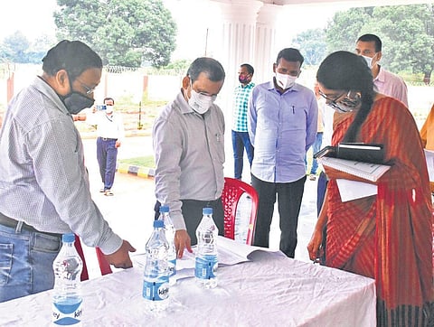 Chief Secretary Suresh Mohapatra reviewing the old age home project at Sartaguda in presence of Kandhamal Collector Brunda D | Express