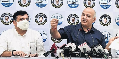 Delhi Deputy CM Manish Sisodia and AAP MP Sanjay Singh (File photo | EPS)