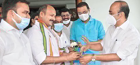 Opposition leader V D Satheesan greets Mohammed Shiyas, the newly appointed DCC president, after addressing mediapersons in Kochi on Sunday. (Photo | A Sanesh, EPS)
