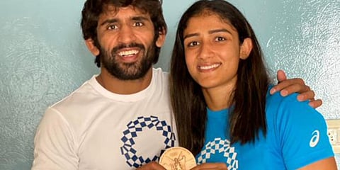 Sangeeta (R) with Bajrang (Twitter Photo)