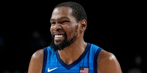 United States' Kevin Durant (7) reacts during men's basketball quarterfinal game against Spain at the 2020 Summer Olympics in Saitama, Japan. (Photo | AP)