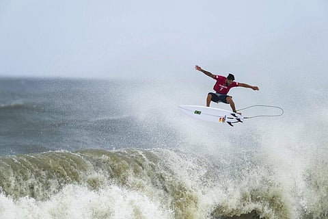 Brazil's Italo Ferreira goes to the air on a wave during the semifinals of the men's surfing competition at the 2020 Summer Olympics. (Photo | AP)