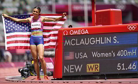 Sydney McLaughlin, of United States celebrates after winning the gold medal in the final of the the women's 400-meter hurdles at the 2020 Summer Olympics. (Photo | AP)