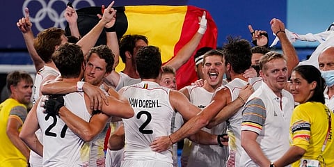 Team Belgium celebrates after winning their men's field hockey gold medal match against Australia in a shootout at the 2020 Summer Olympics in Tokyo, Japan. (Photo | AP)