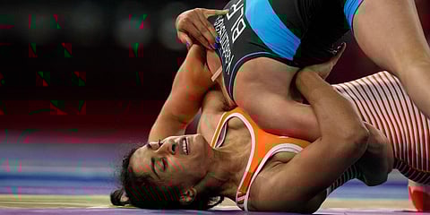 India's Vinesh Phogat compete with Belarus' Vanesa Kaladzinskaya Tiako during the women's 53kg Freestyle wrestling eight final match at the 2020 Summer Olympics in Tokyo, Japan. (Photo | AP)