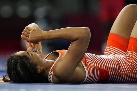 India's Vinesh Vinesh compete with Belarus' Vanesa Kaladzinskaya Tiako during the women's 53kg Freestyle wrestling eight final match at the 2020 Summer Olympics. (Photo | AP)