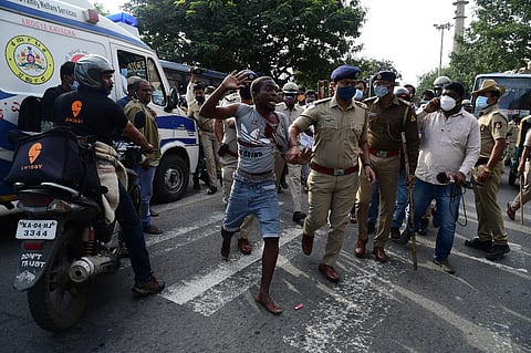 File photo of a group of Africans staged a protest outside JC Nagar police station after an alleged custodial death of a Congo national on Monday in Bengaluru (Express Photo | Shriram BN)