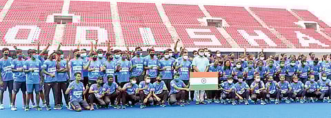 Young hockey players of Naval Tata Hockey Acdemy with Sports Minister Tusharkanti Behera | Express