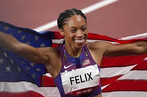 Allyson Felix, of United States smiles after taking the bronze, in the final of women's 400-meters at the 2020 Summer Olympics. (Photo | AP)