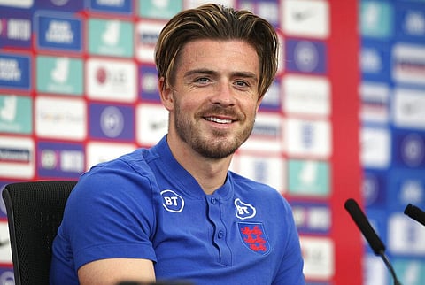 England's Jack Grealish smiles during a press conference after an open training session at St. George's Park, Burton-upon-Trent. (Photo | AP)