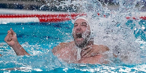 Serbia's Filip Filipovic celebrates after scoring the winning goal against Spain in a semifinal round men's water polo match at the 2020 Summer Olympics in Tokyo, Japan. (Photo | AP)