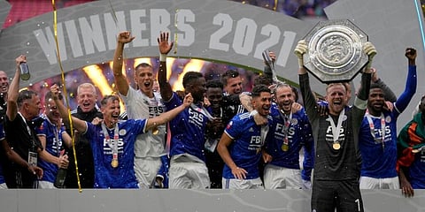 Leicester's goalkeeper Kasper Schmeichel lifts the trophy after winning the English FA Community Shield. (Photo | AP)