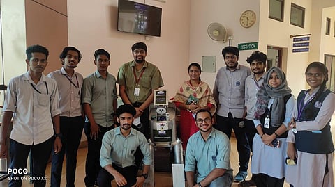 The KMEA student team members with the humanoid robot they built | EXPRESS