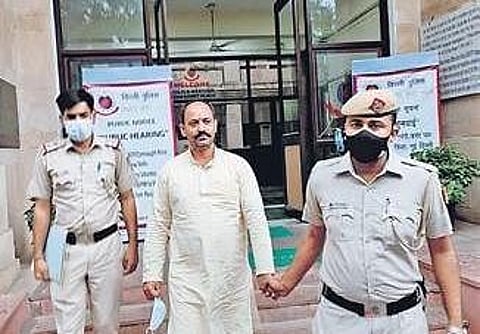 Pinki Chaudhary in police custody on Tuesday. (Photo | PTI)