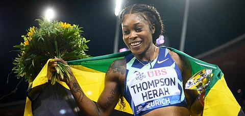 Elaine Thompson-Herah of Jamaica after winning the women's 100 m race during the Weltklasse IAAF Diamond League international athletics meeting at the Letzigrund stadium in Switzerland. (Photo | AP)