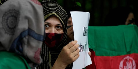 Afghan refugees protest against the Taliban takeover of Afghanistan, in New Delhi. (Photo| AP)