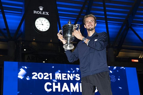 Daniil Medvedev, of Russia, holds up the championship trophy after defeating Novak Djokovic, of Serbia, in the men's singles final of the US Open tennis championships. (Photo | AP)