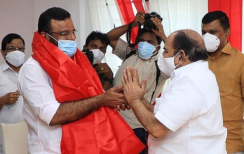Former KPCC general secretary KP Anil Kumar is received by CPM politburo member Kodiyeri Balakrishnan at AKG Center in Thiruvananthapuram on Tuesday.