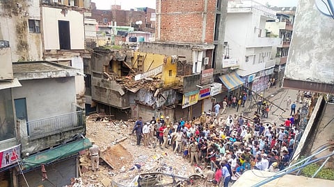 Scenes from the building collapse site in Delhi's Sabzi Mandi site (Photo | Parveen Negi, EPS)