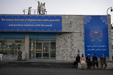 In this Sept. 9, 2021, photo, Taliban personnel and airport staffers sit at the airport in Kabul, Afghanistan. (Photo | AP)