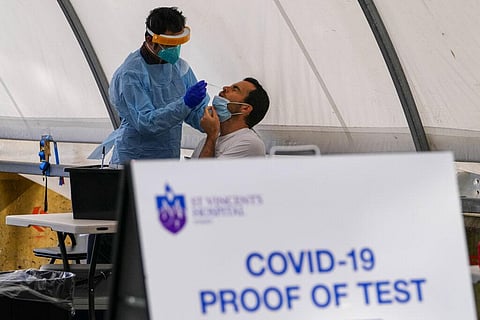 A man receives a COVID-19 test in the eastern suburbs of Sydney Tuesday, Sept. 14, 2021. (Photo | AP)
