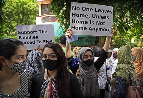 Afghans living in Delhi participate in a protest outside the UNHCR office (United Nation High Commissioner for Refugees) in New Delhi. (File Photo | AP)