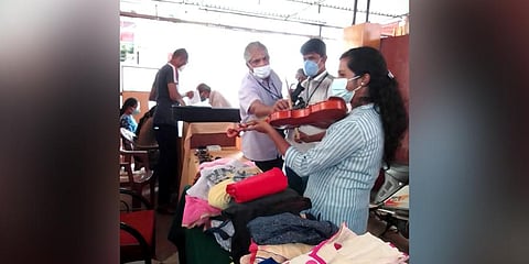 Cycles and music instruments on display at the flea market.