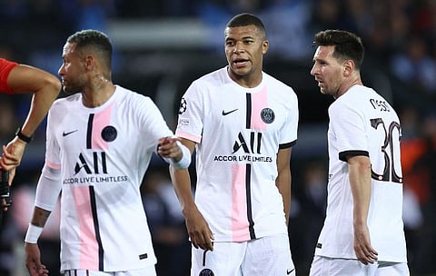 PSG forwards Neymar (L), Kylian Mbappe (C) and Lionel Messi look on during UCL match agianst Club Brugge at Jan Breydel Stadium in Bruges, on September 15, 2021. (Photo | AFP)