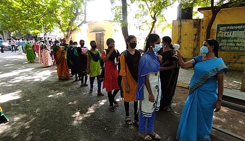 Students undergoing thermal screening. (File Photo | G Pattabiraman, EPS)