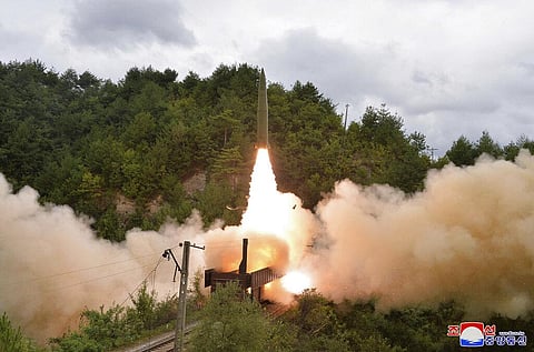A test missile is launched from a train on Sept. 15, 2021, in an undisclosed location of North Korea. (Photo | AP)
