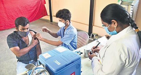 A health worker administers Covid vaccine in Bengaluru on Friday | Ashishkrishna HP