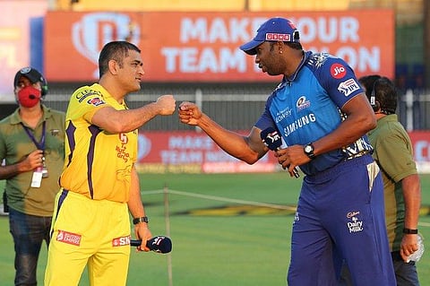 Chennai Super Kings captain MS Dhoni and Mumbai Indians stand-in skipper Kieron Pollard. (File Photo | Twitter)