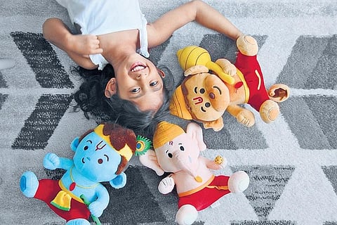 Baby versions of Hindu gods Ganesha, Krishna and Hanuman with squeezy bellies, these toys when pressed, belt out shlokas.