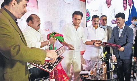 Industries Minister KT Rama Rao, along with Ministers Singireddy Niranjan Reddy and Gangula Kamalakar, at the MoU signing ceremony, on Friday | S Senbagapandiyan