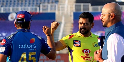 CSK Skipper MS Dhoni and Mumbai Indians Captain Rohit Sharma during the toss for the first cricket match of IPL 2020 at Sheikh Zayed Stadium. (File photo | PTI)