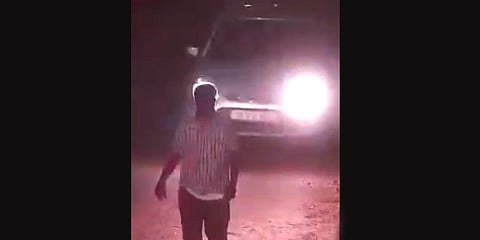 CCTV camera footage of Selvam walking and the car behind him. (Photo | EPS)