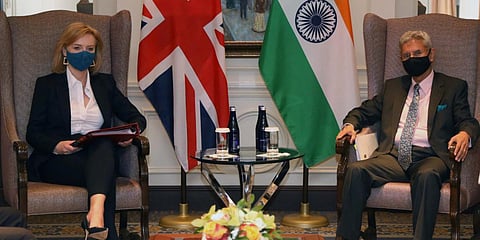 British Foreign Secretary Elizabeth Truss (L) and Indian External Affairs Minister S Jaishankar. (Photo| Twitter/ @DrSJaishankar)