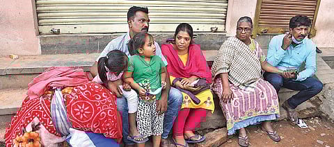 Saramma (63) and her family outside their house after the explosion at New Tharagupet in Bengaluru on Thursday