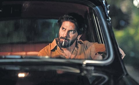 Actor-producer Dulquer Salmaan in a still from 'Kurup'.