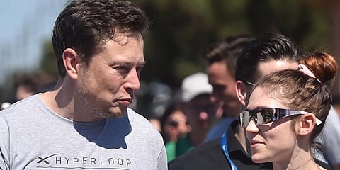 Elon Musk and Grimes (Photo | YouTube screengrab)