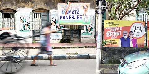 Graffiti of TMC and BJP flags adorn the streets of Bhowanipore in Kolkata. It is a wait and watch situation as the non-Bengali voters hold key in this crucial bypoll. (Photo | Sayantan Ghosh)
