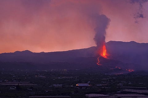 Lava flows from a volcano on the Canary island of La Palma, Spain in the early hours of September 26. (Photo | AP)